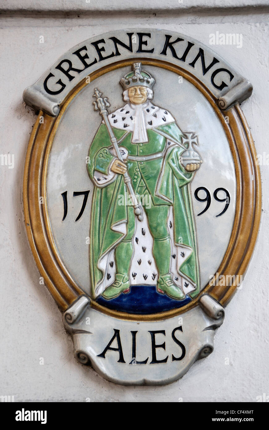 Greene King Ales plaque sur un mur. Banque D'Images