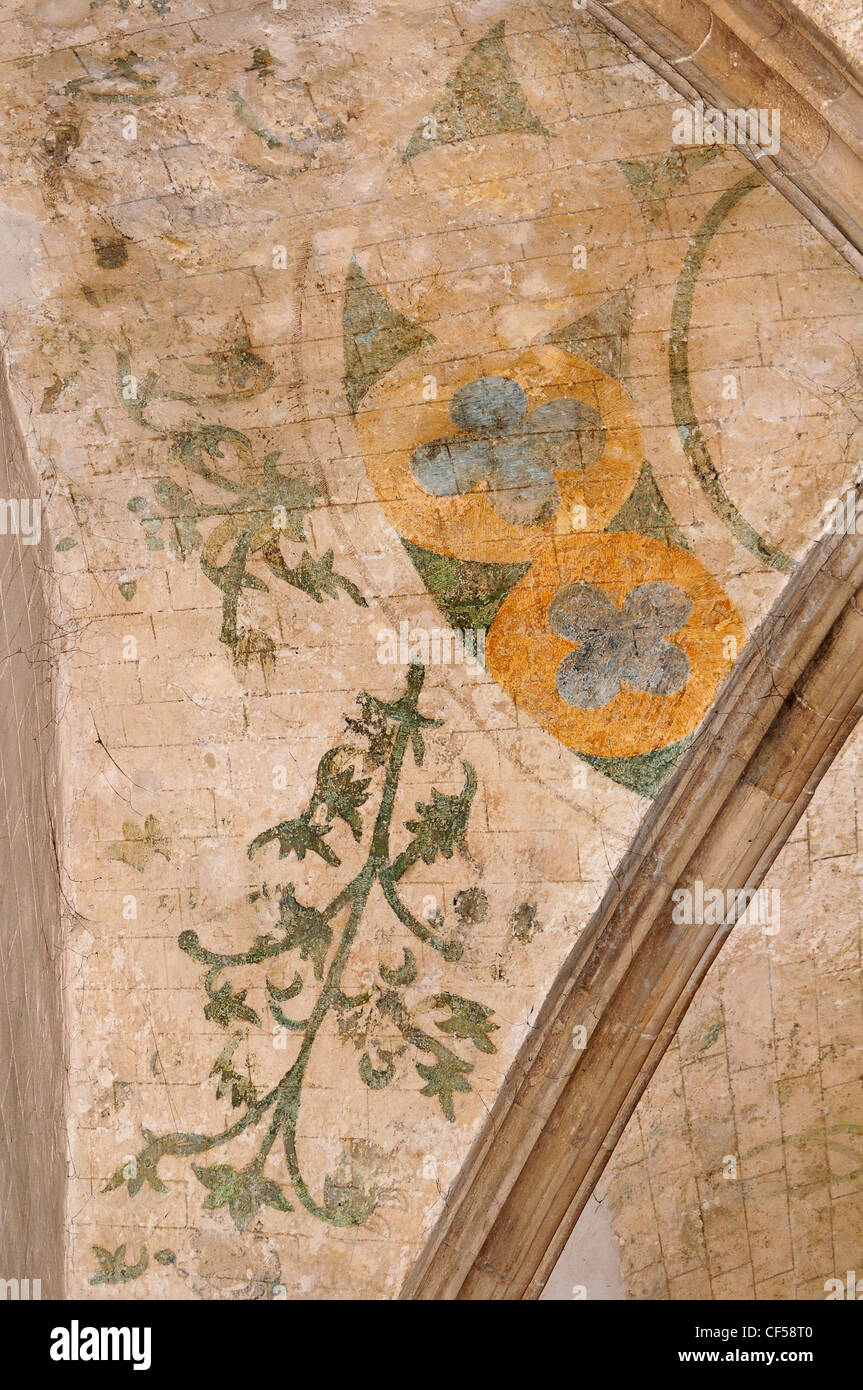 Vestiges de la fin de la peinture médiévale dans la voûte du bas-côté sud, la cathédrale de la Sainte Trinité de Chichester. Banque D'Images