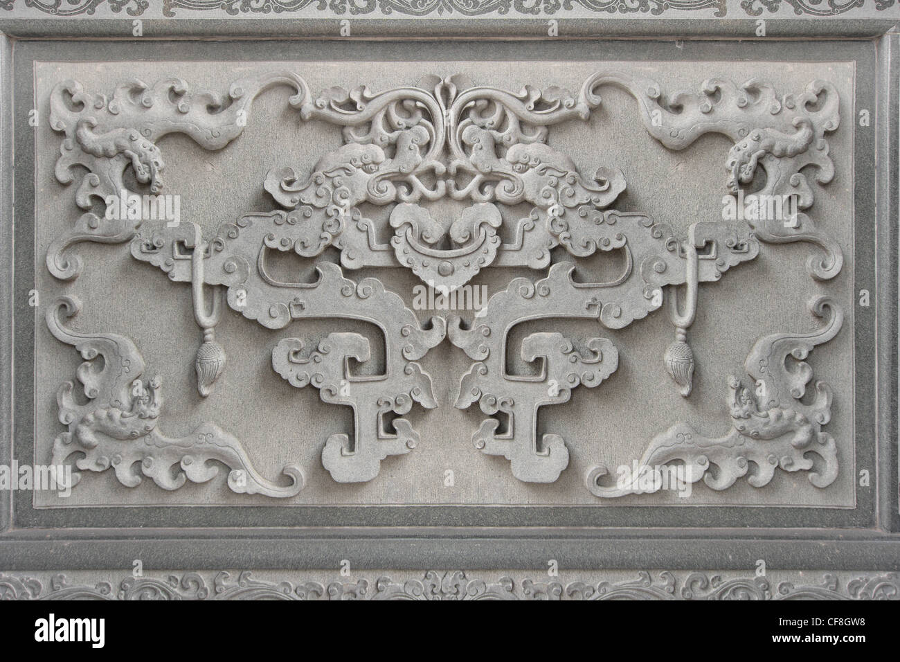 Les chauves-souris mur Symbole chinois de la sculpture sur pierre à l'extérieur de Temple taoïste Banque D'Images