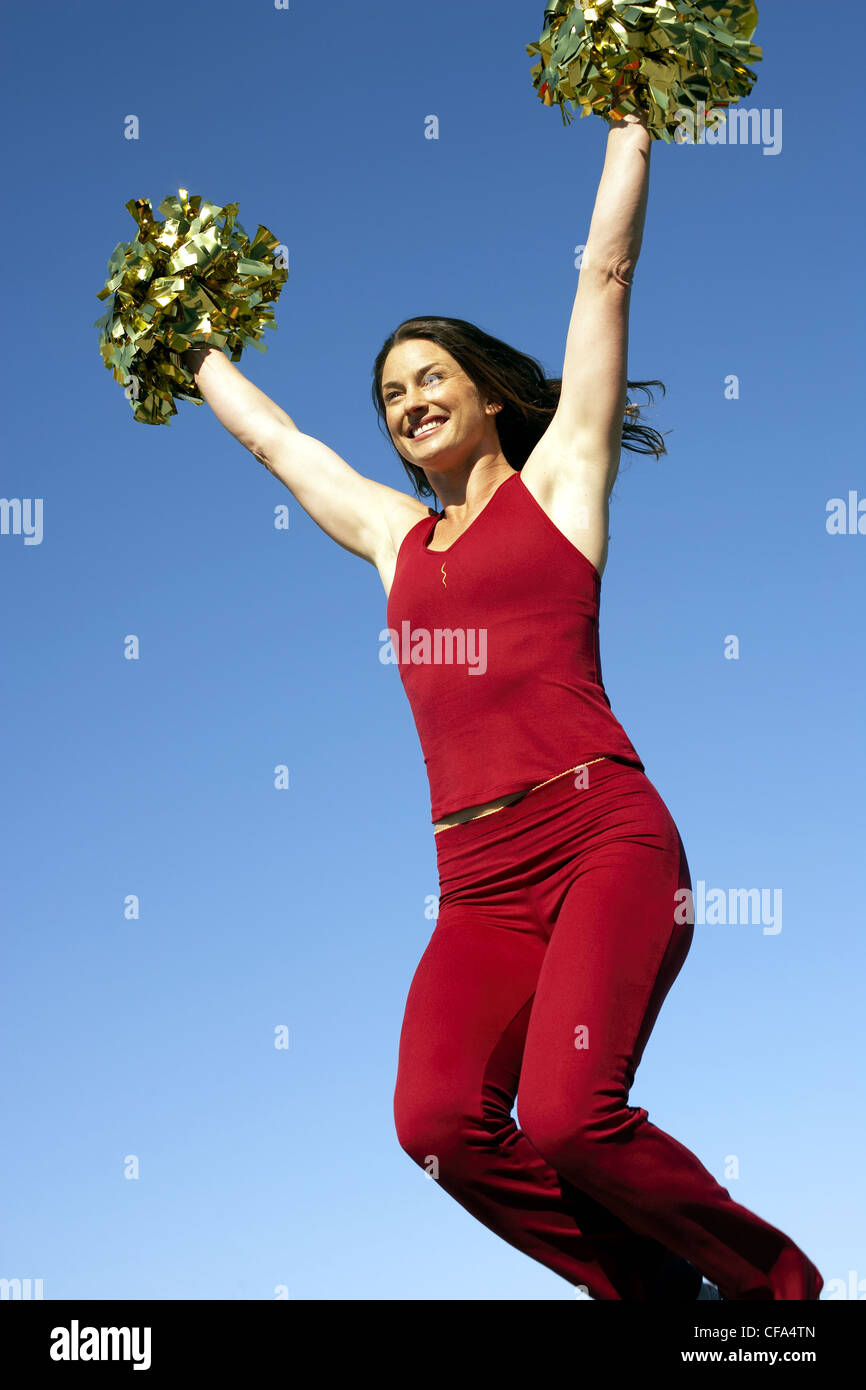 Cheerleading pom poms Banque de photographies et d'images à haute  résolution - Alamy