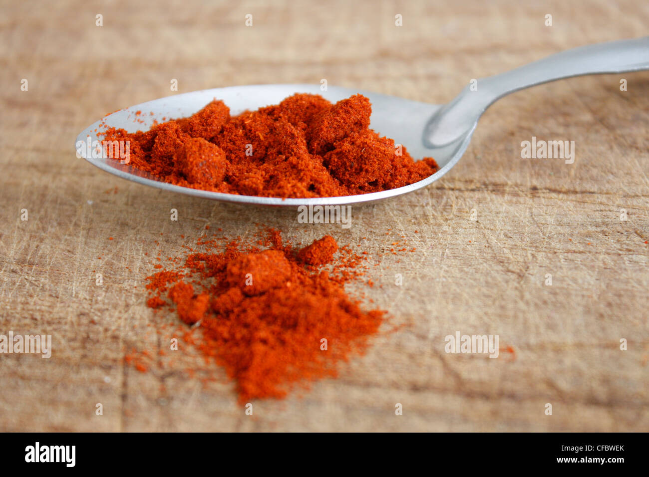 Paprika on a wooden surface Banque D'Images