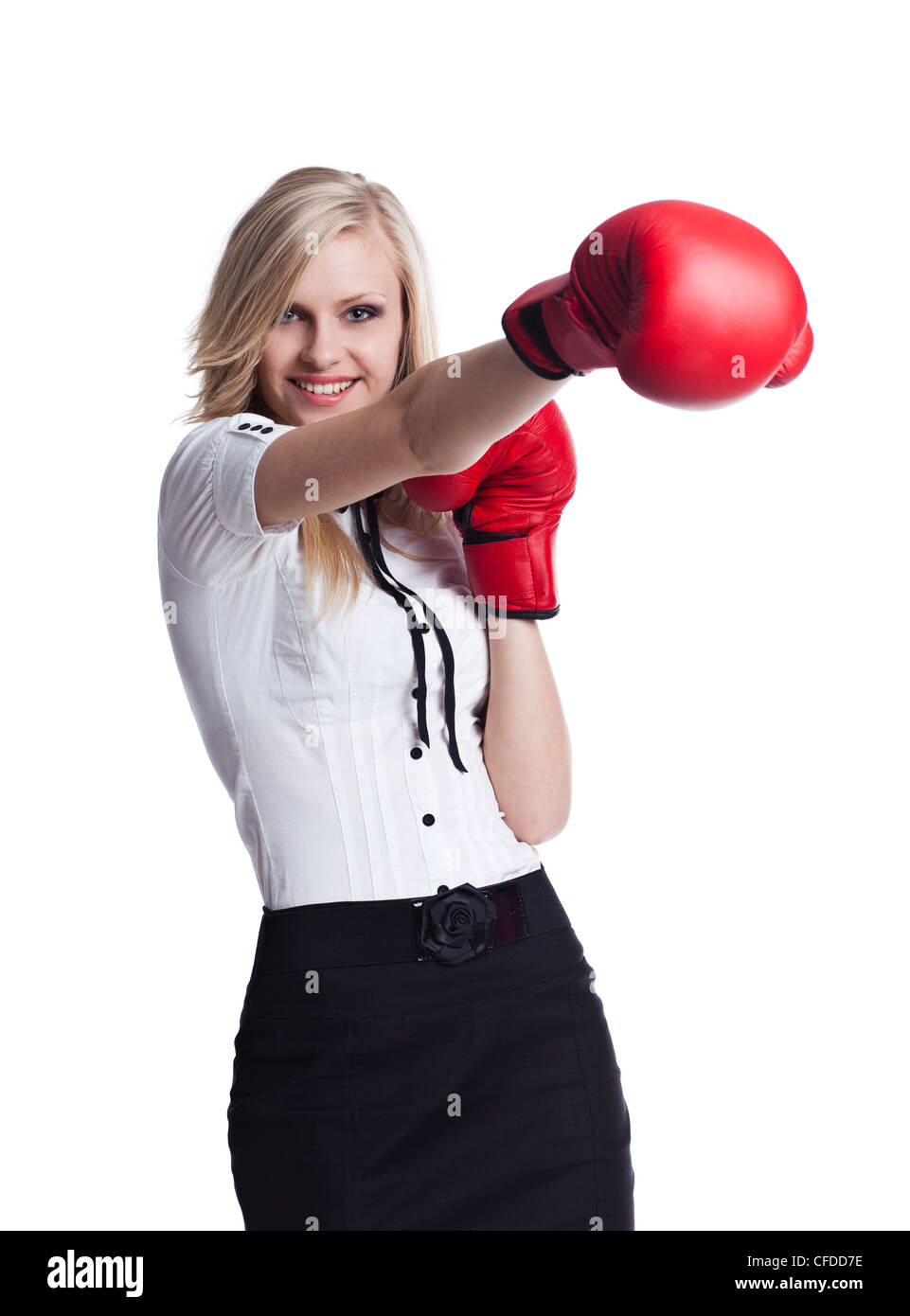 Portrait de la belle et jeune business woman wearing boxing gloves Banque D'Images