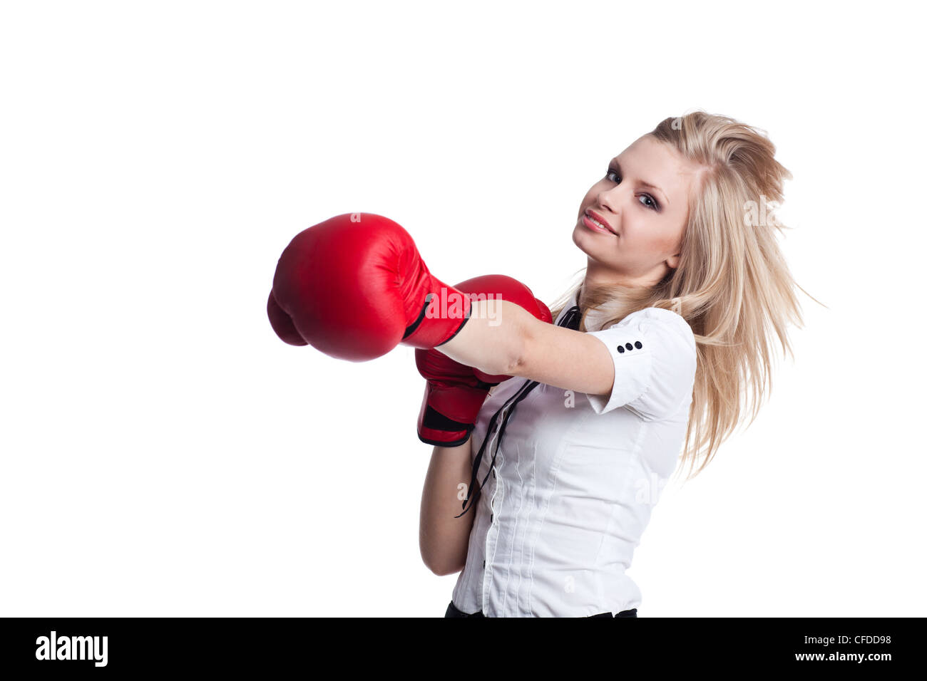 Portrait de la belle et jeune business woman wearing boxing gloves Banque D'Images