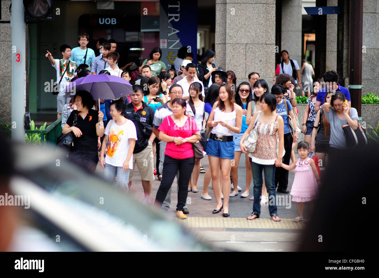 En attendant d'atteindre les consommateurs du marché de la rue Bugis Singapore Banque D'Images