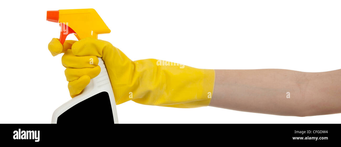 La main gantée de caoutchouc jaune avec vaporisateur Banque D'Images