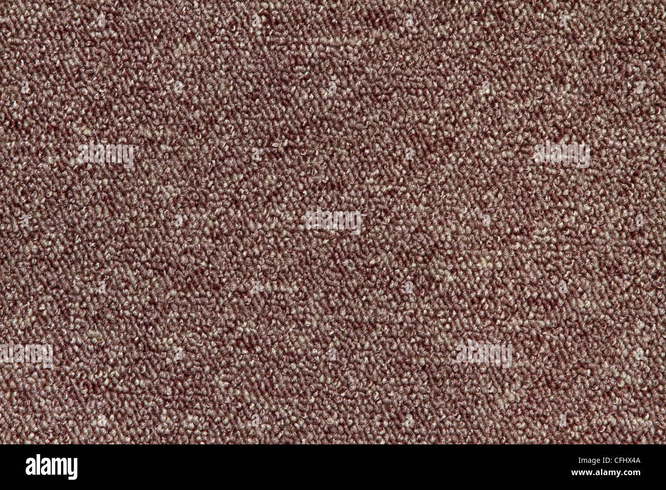 La texture d'un tapis de couleur marron avec des tas. Banque D'Images