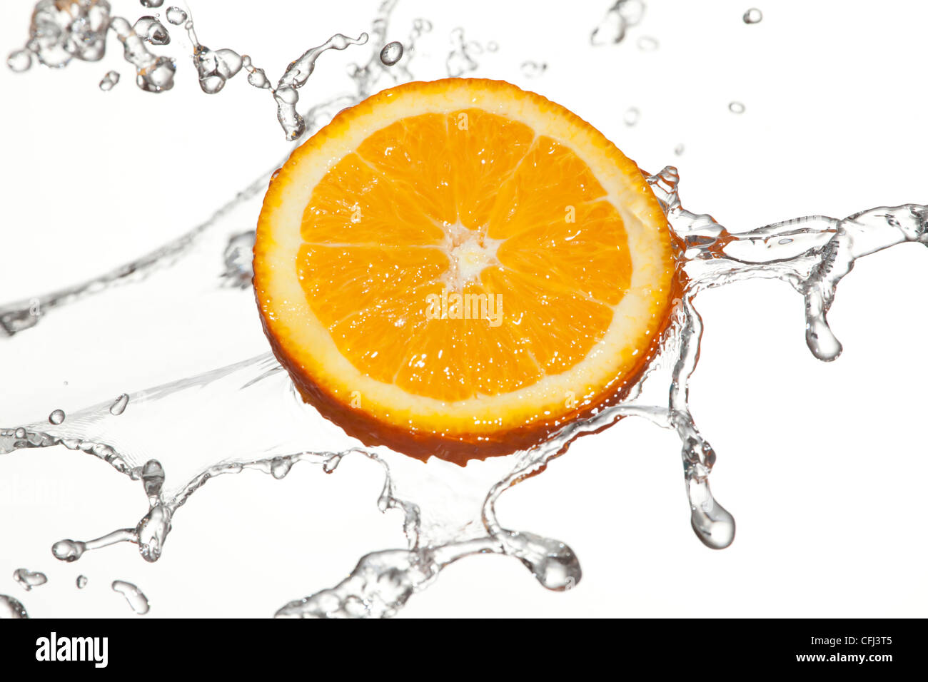 Avec de l'eau éclaboussée orange Banque D'Images