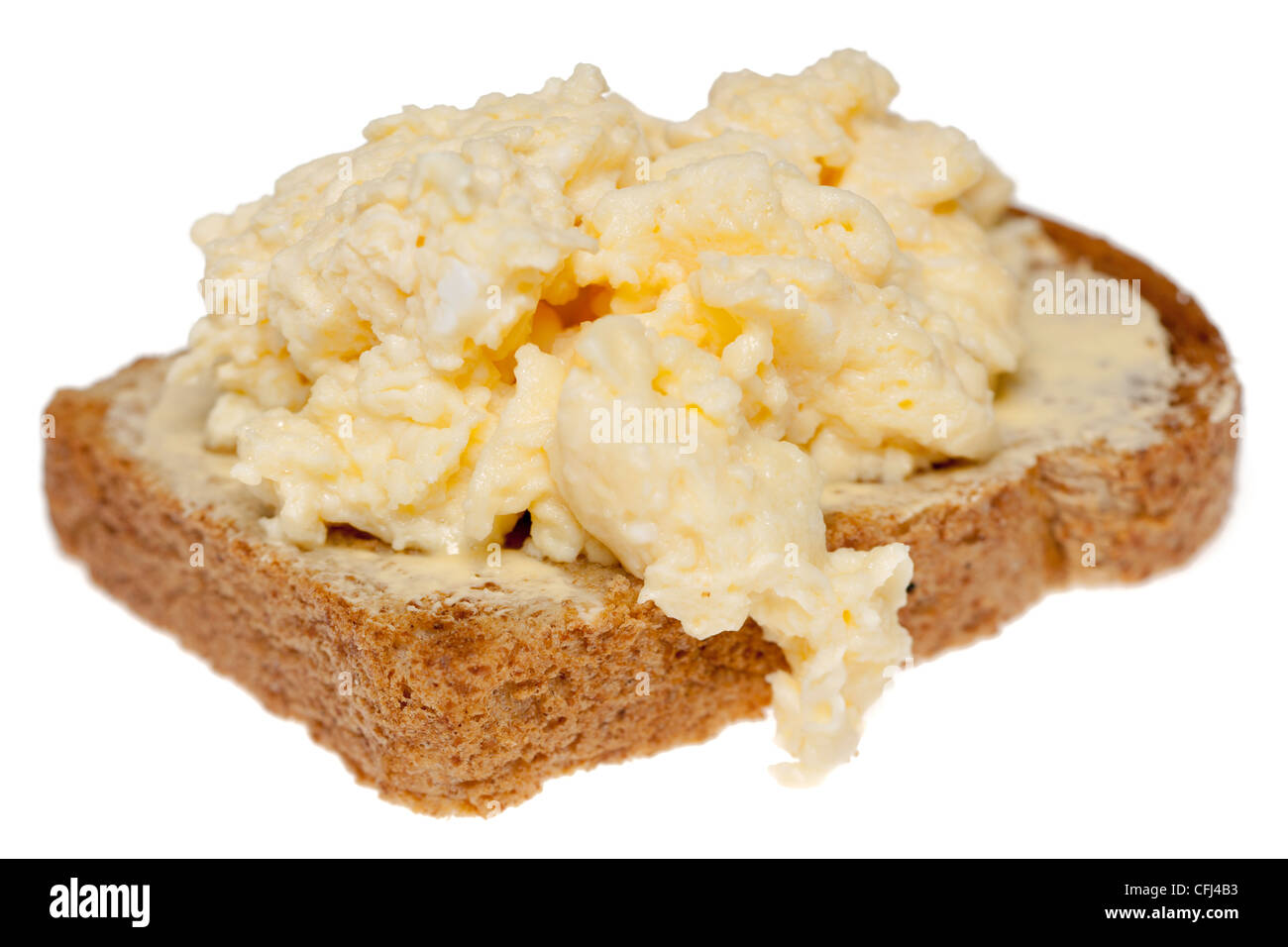 Des œufs brouillés sur toast complet Banque D'Images