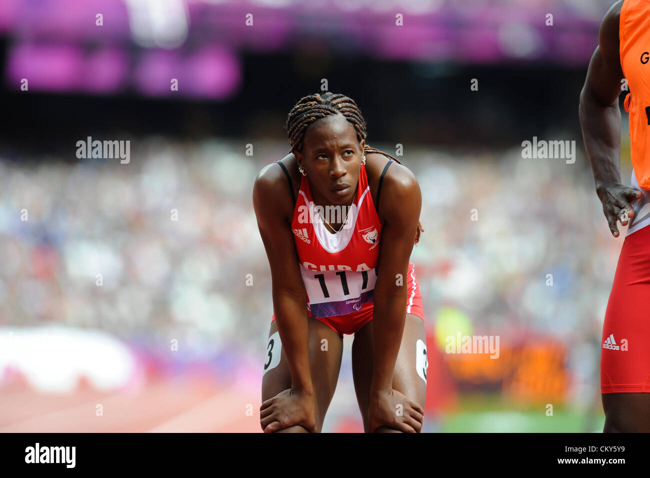 01.09.2012. Londres, Angleterre. Women's 100m T12. Danieris Mijan (CUB) en compétition durant la 3e Journée de la natation paralympique du Stade Olympique. Banque D'Images