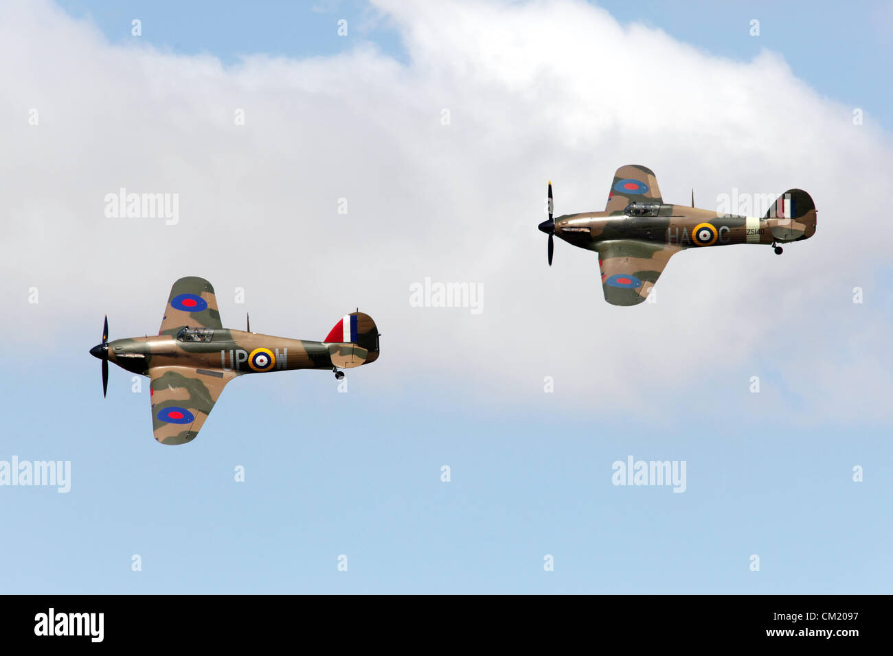 Goodwood Estate, Chichester, Royaume-Uni. 15 septembre 2012. Quatre Mk 4, 5 et 9 Spitfire prenez l'air dans le cadre d'un memorial flight pour bataille de Britiain journée au Goodwood Revival le revival est une étape magique dans le temps', présentant un mélange de voitures et de l'aviation des années 40, 50 et 60 et est l'un des plus populaires courses automobiles historiques dans le monde. Pour plus de renseignements, veuillez visiter www.goodwood.co.uk/renaissance. Banque D'Images