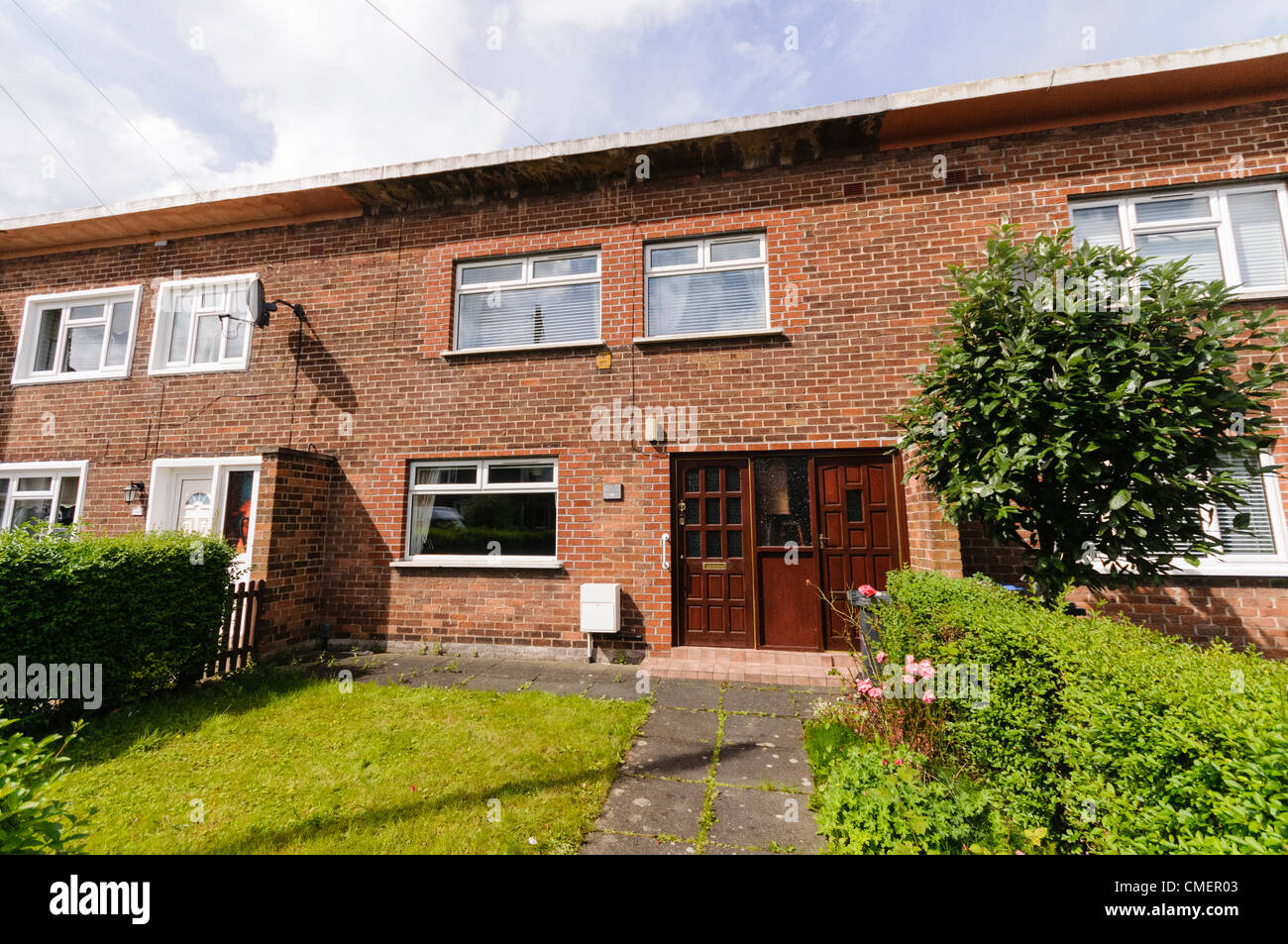 Belfast, 31/07/2012 - L'ancienne maison de George Best footballeur et sa famille dans le Burren Way a été acheté pour 100 000 livres, et sera disponible pour la location de vacances à 125 €/jour Banque D'Images