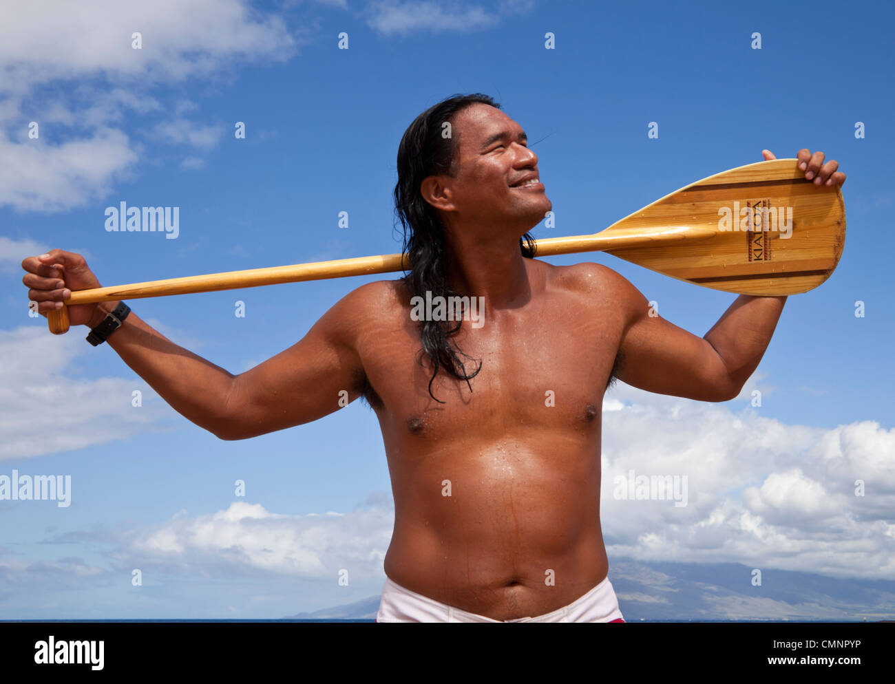 Outrigger Canoe guide à Wailea Beach sur l'île de Maui Banque D'Images