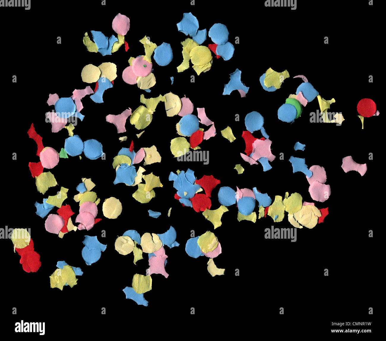 Des morceaux de papier coloré confettis. L'élément d'arrière-plan de fête Carnaval. Banque D'Images