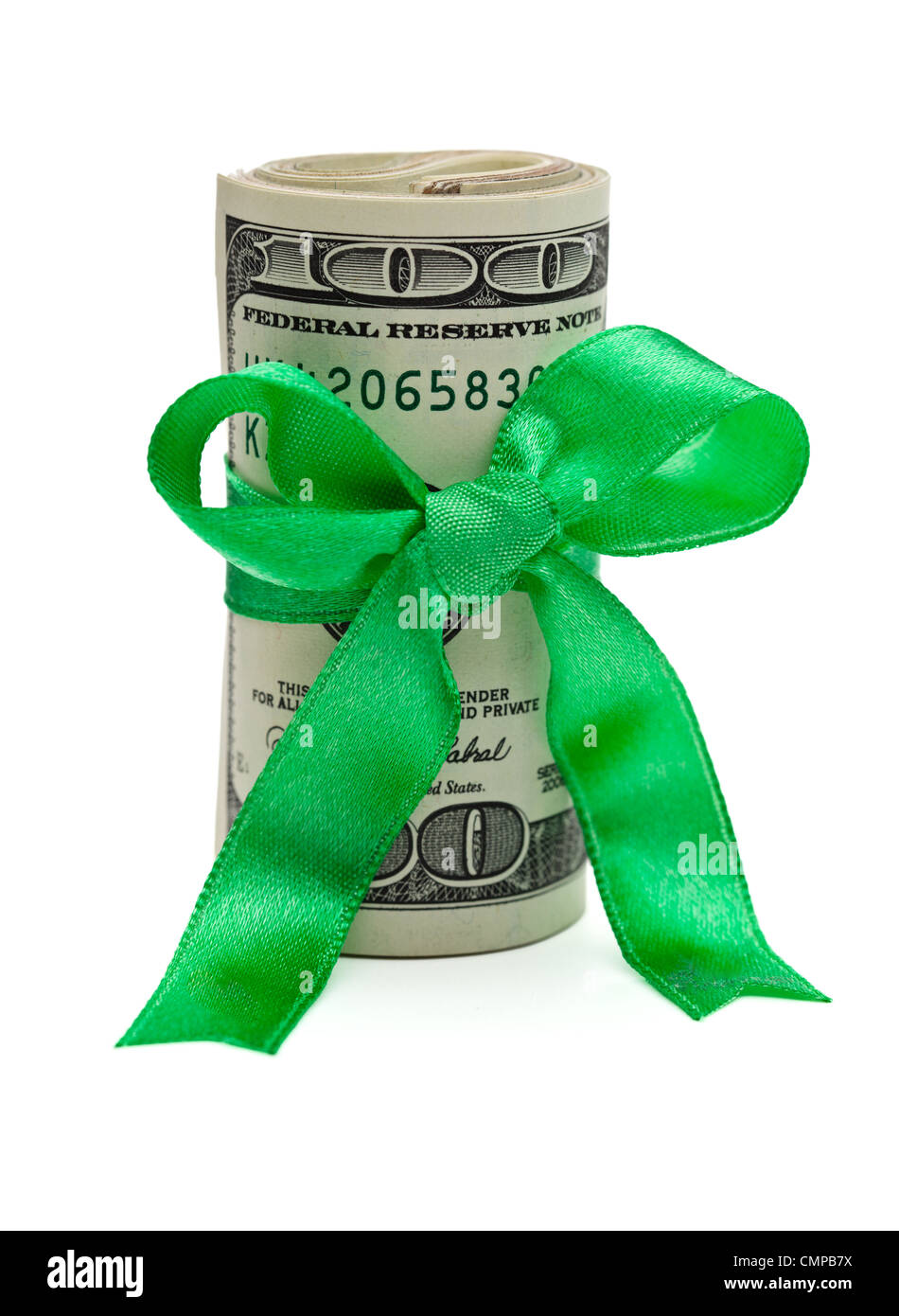 Une liasse de cent billets d'un dollar US enveloppé dans un ruban vert avec un cadeau bow attaché. Banque D'Images