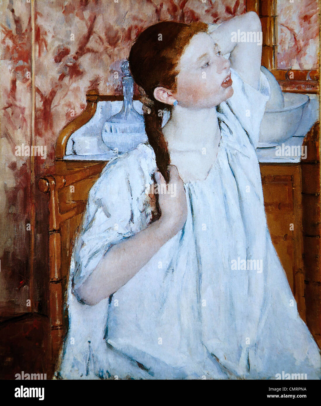 Mary Cassatt, fille d'organiser ses cheveux Banque D'Images