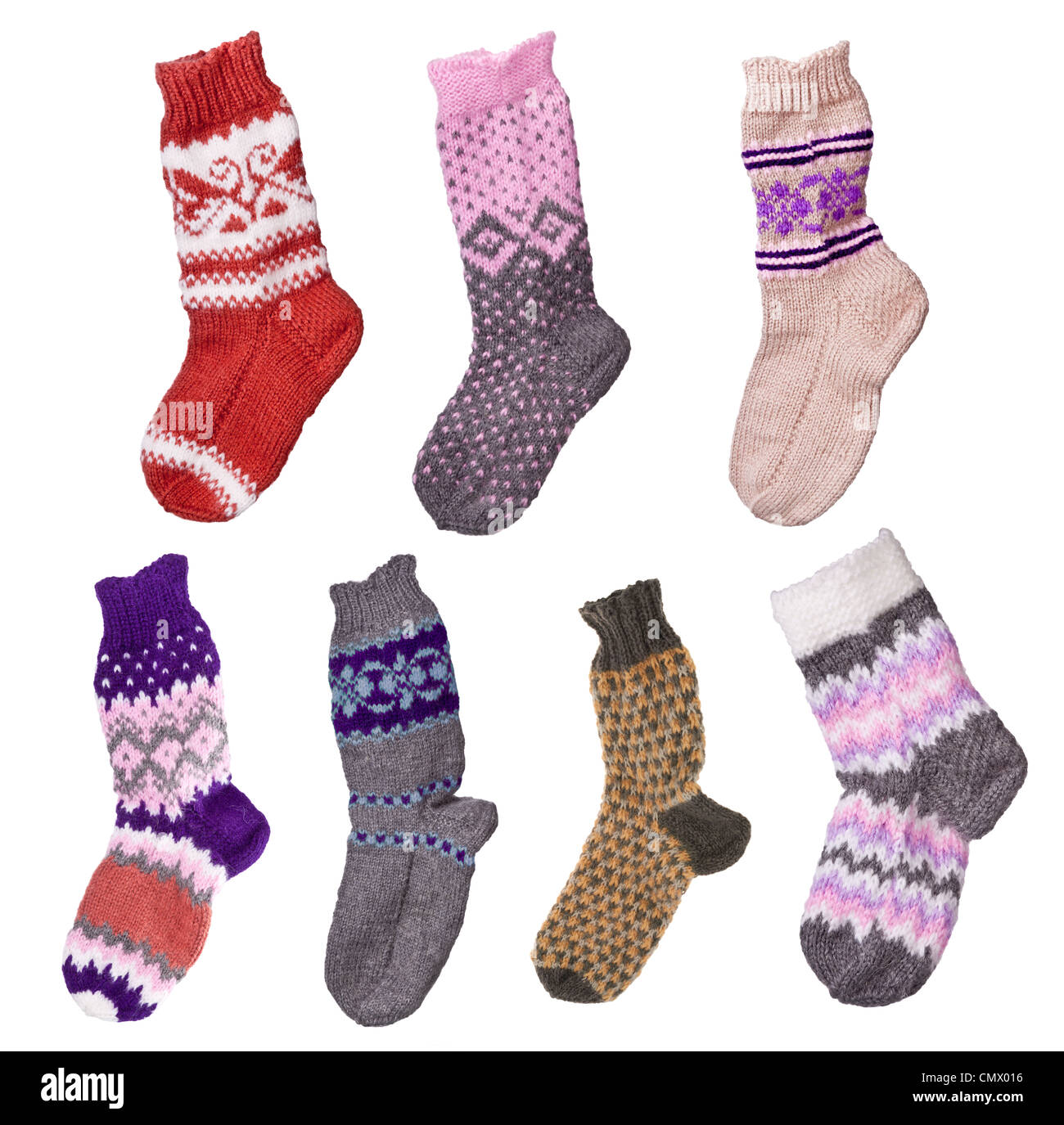 Collection de chaussettes de laine tricotées à la main sur un fond blanc Banque D'Images