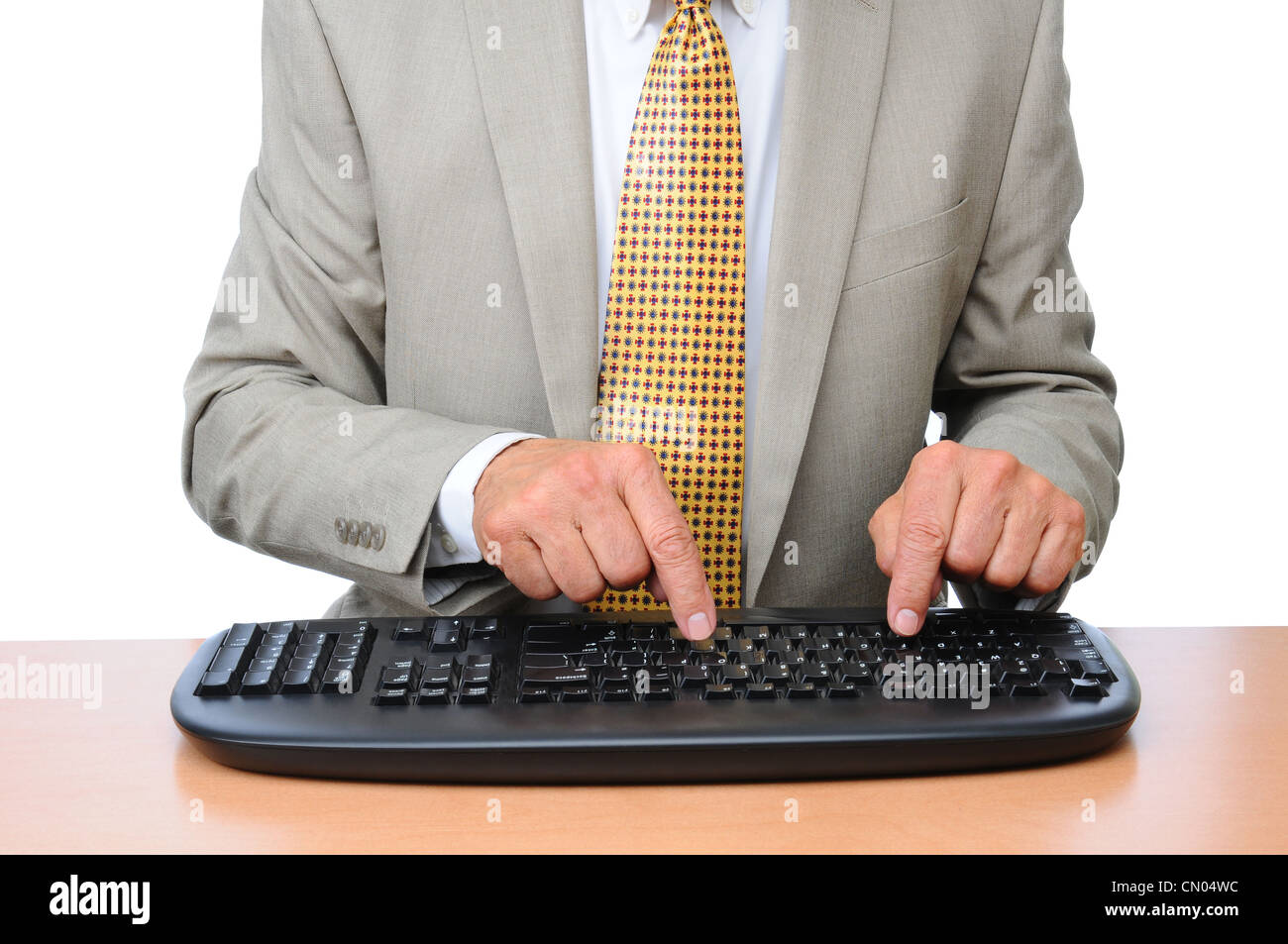 Libre d'un homme d'affaires de la saisie sur un clavier sans fil. Banque D'Images