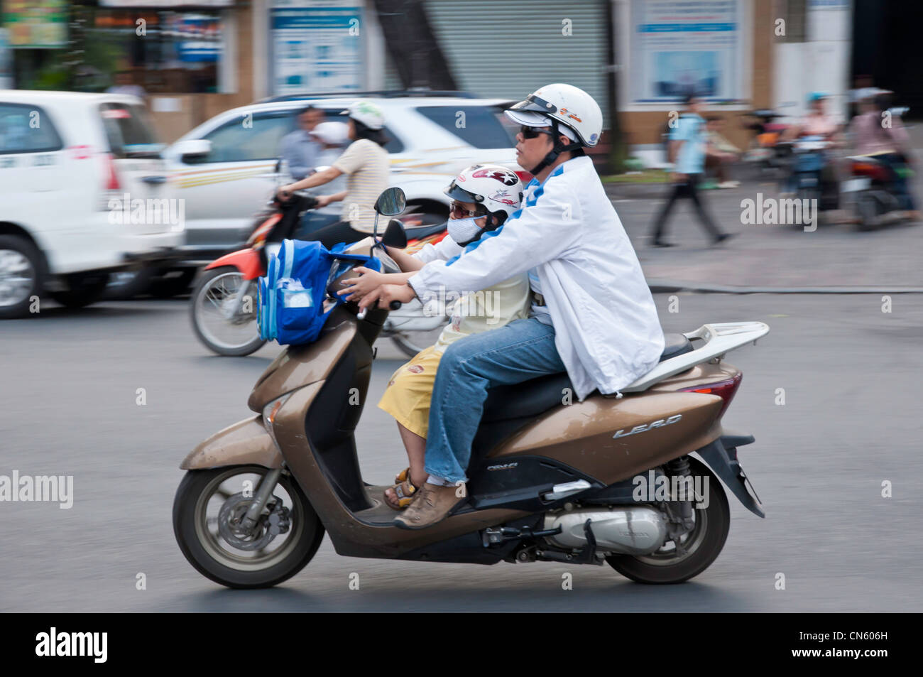 Accueil Voyage écolier en moto, Saigon, Vietnam Banque D'Images
