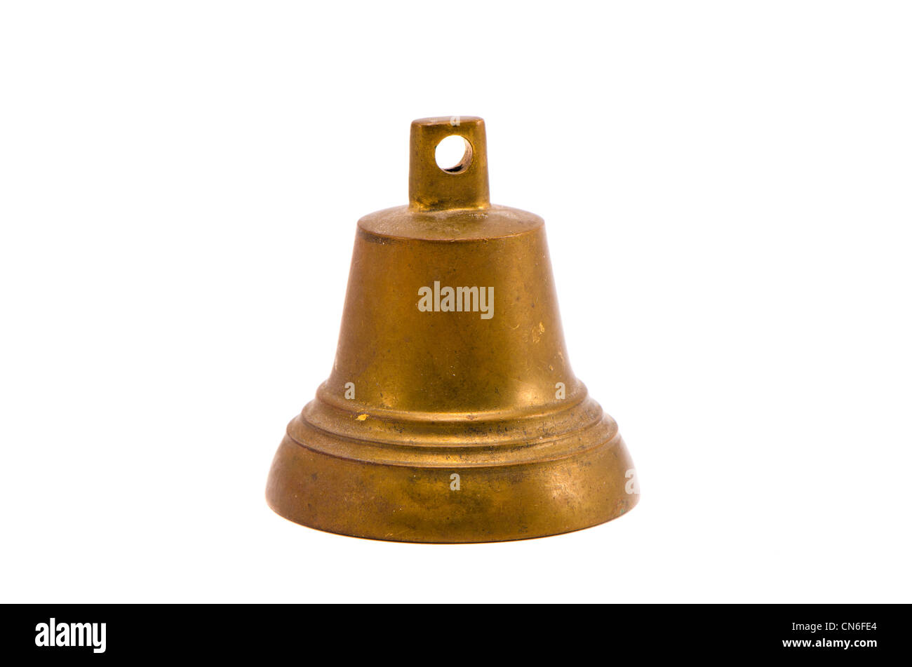 Isolé sur fond blanc vieille cloche en laiton Banque D'Images