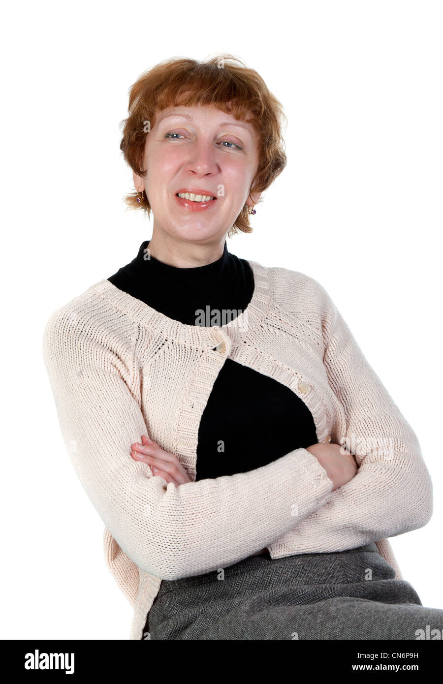 Portrait of a smiling middle-aged woman en studio sur un fond blanc Banque D'Images