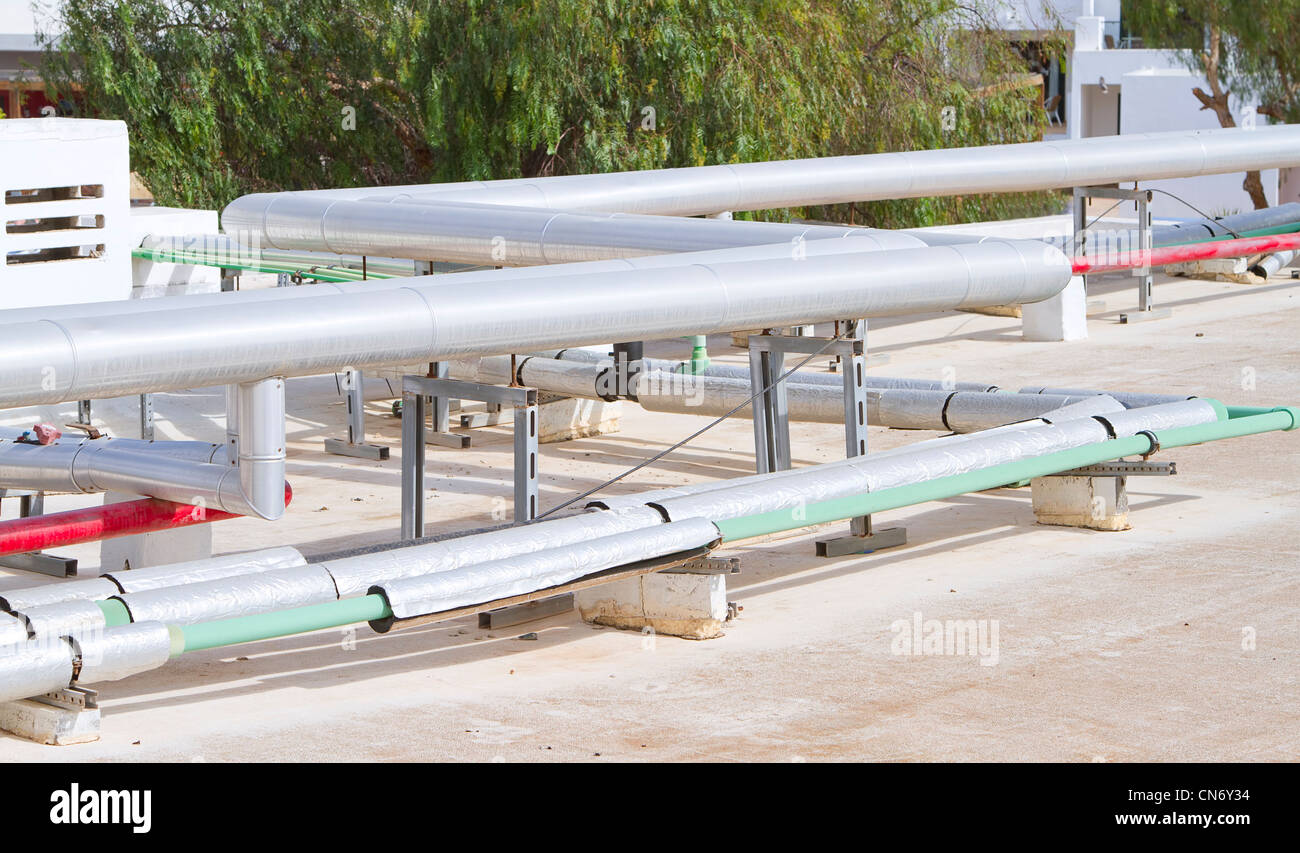 Tuyaux sur le toit de l'hôtel Banque D'Images