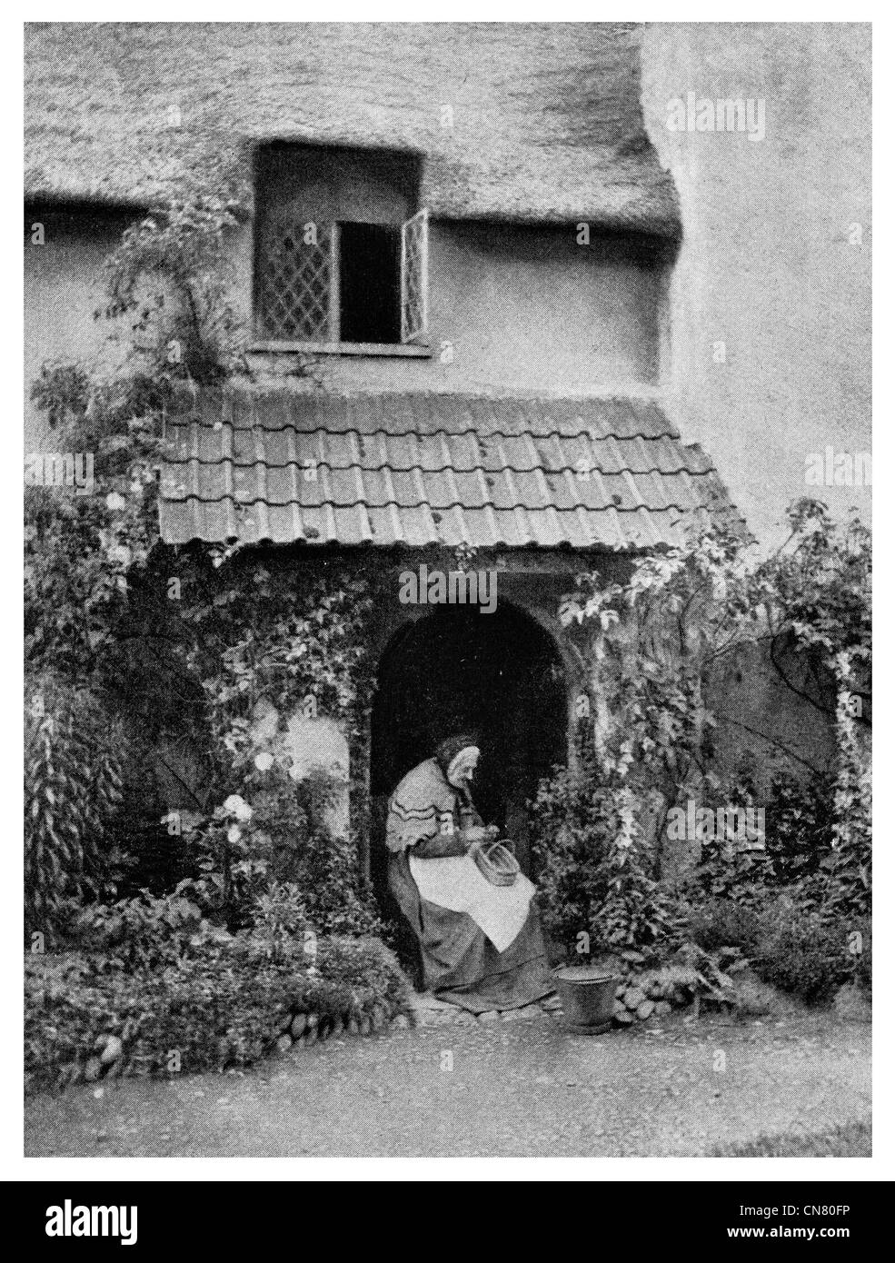 Vieille Femme Âge thatch cottage home chambre 1900 Banque D'Images