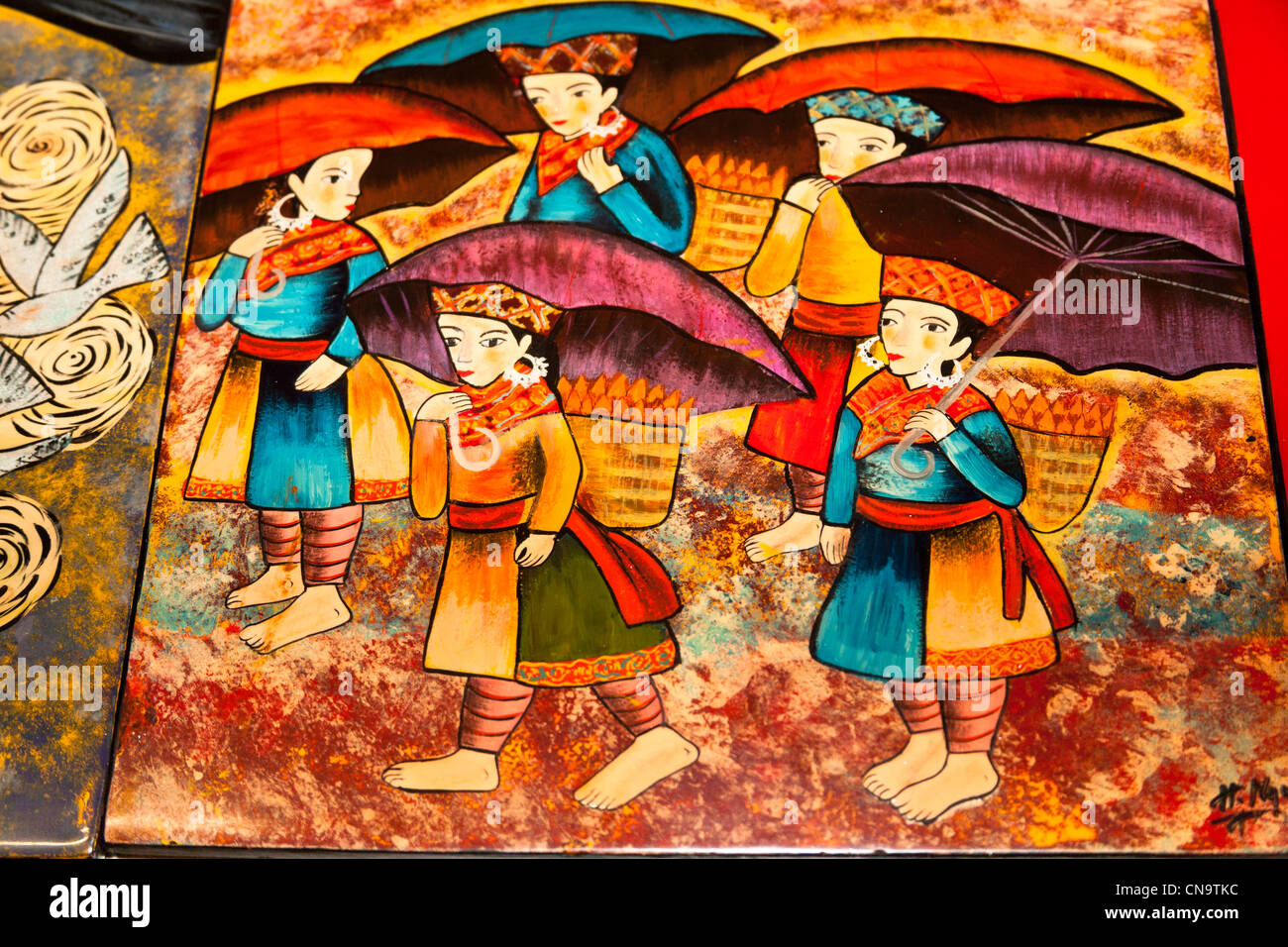 Peinture colorée des femmes vietnamiennes holding parasols, Vietnam Banque D'Images