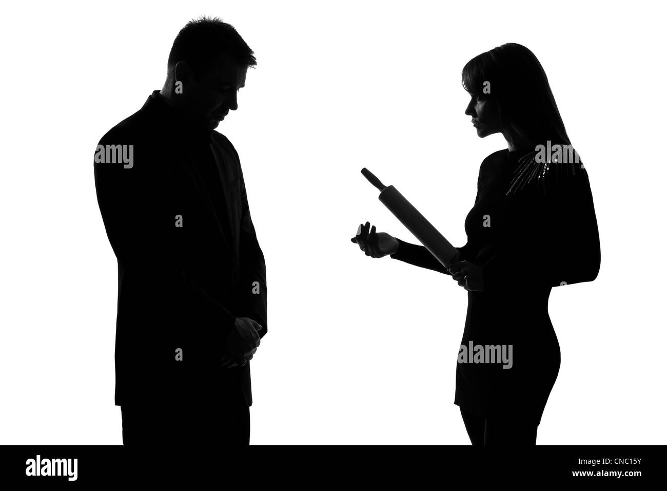 Un couple l'homme et la femme l'expression de la violence domestique en silhouette studio isolé sur fond blanc je Banque D'Images