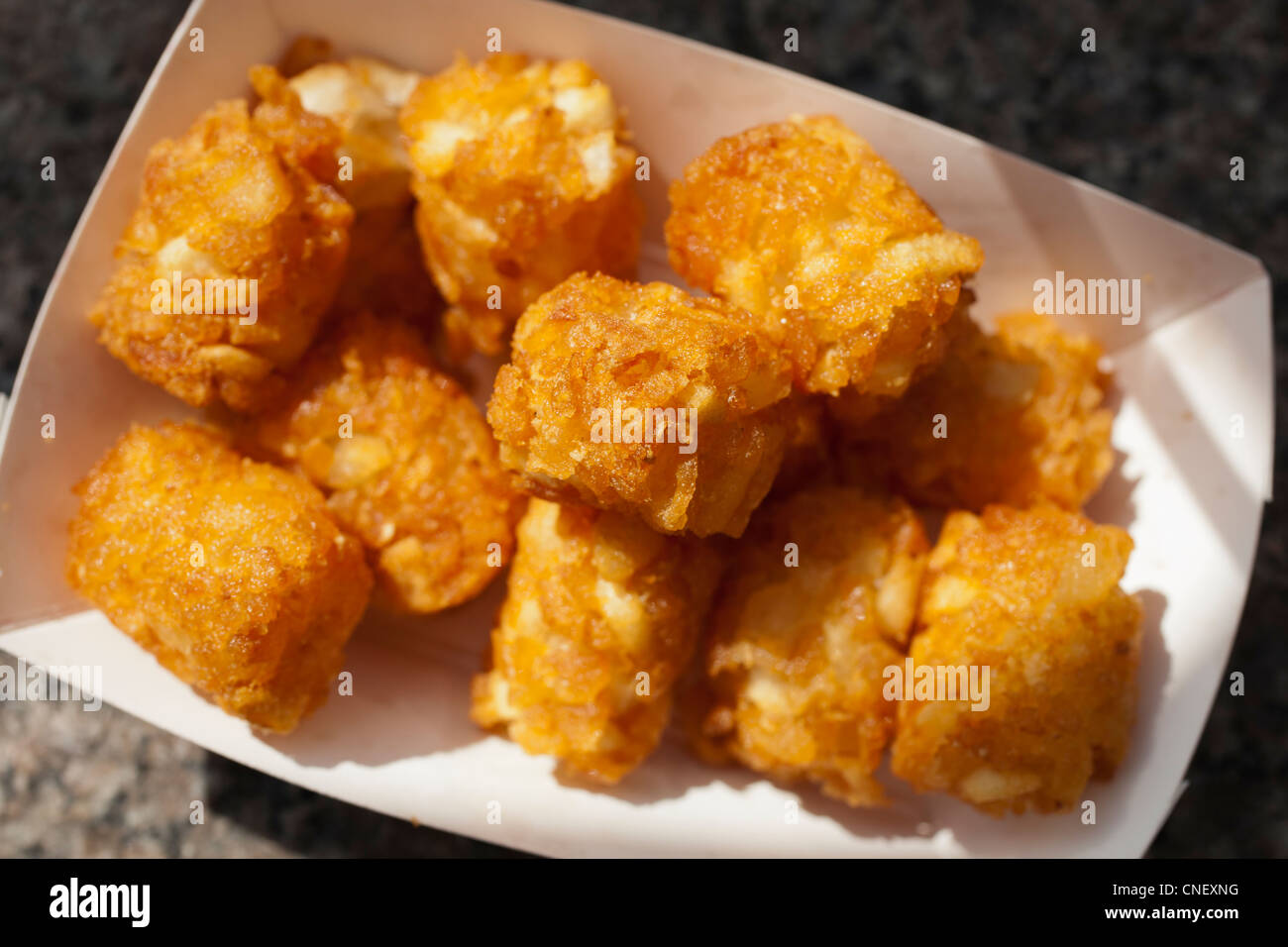 Tater Tots, cylindres de pommes de terre frites, râpé Banque D'Images