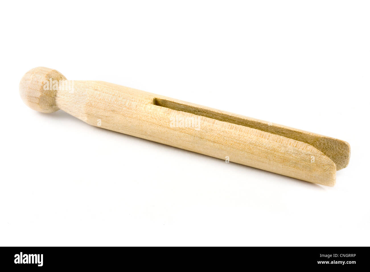 En bois à l'ancienne colthes peg over white Banque D'Images En bois à l'ancienne colthes peg over white Banque D'Images