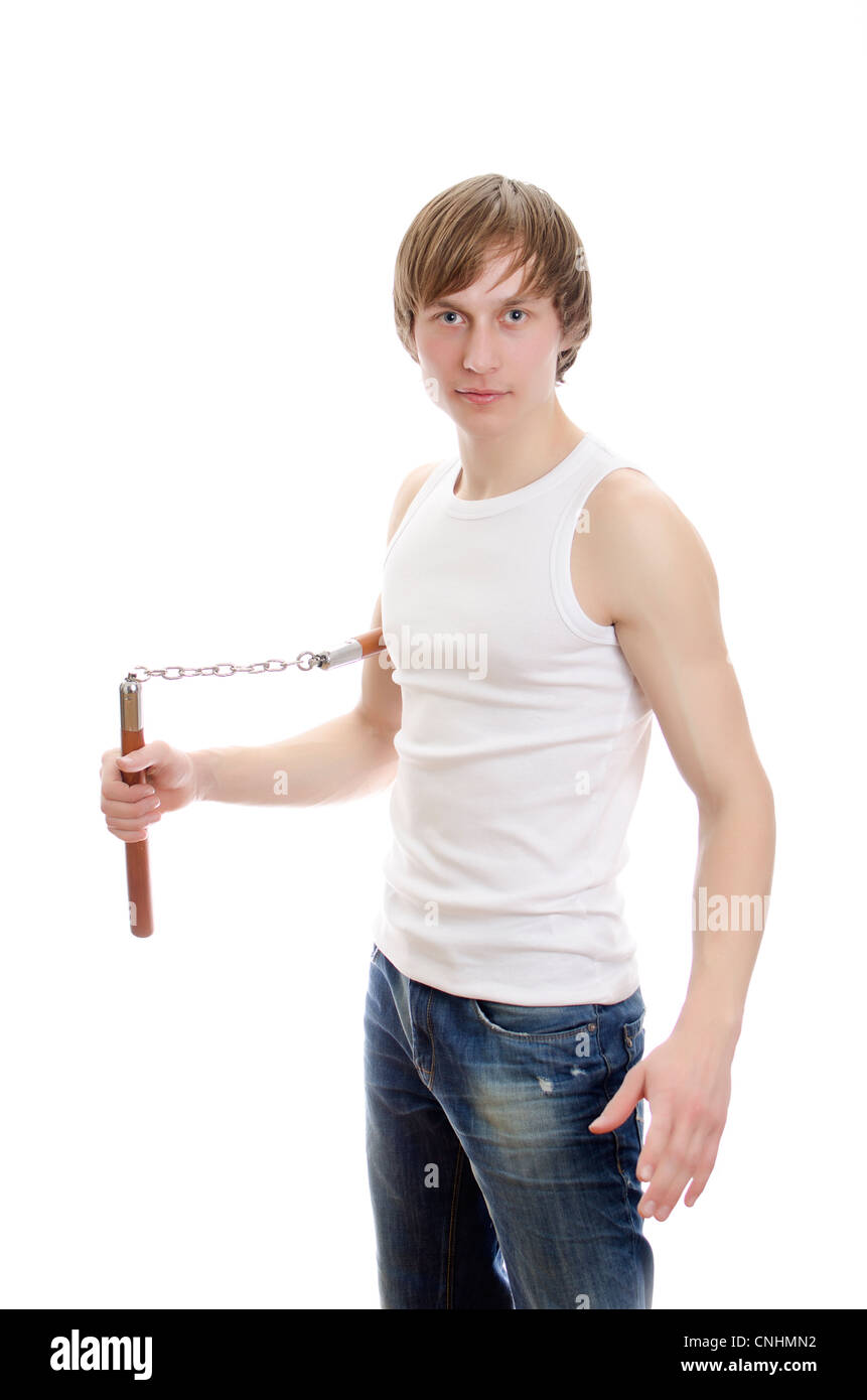 L'art martial Homme avec nunchucks. Isolated over white. Banque D'Images
