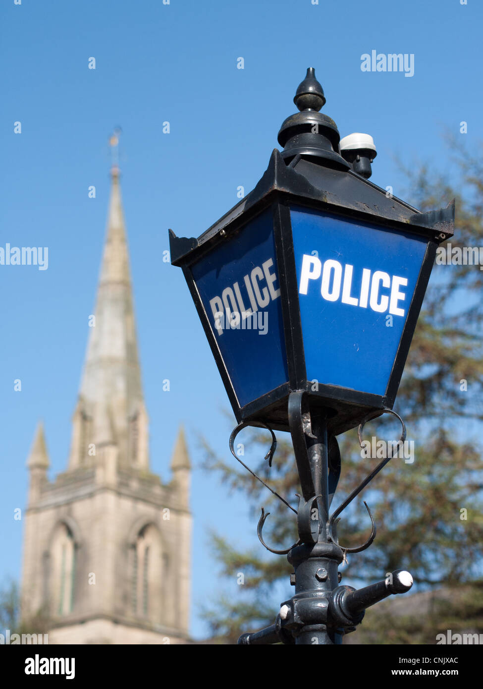 Station de police traditionnels signe avec en arrière-plan Banque D'Images