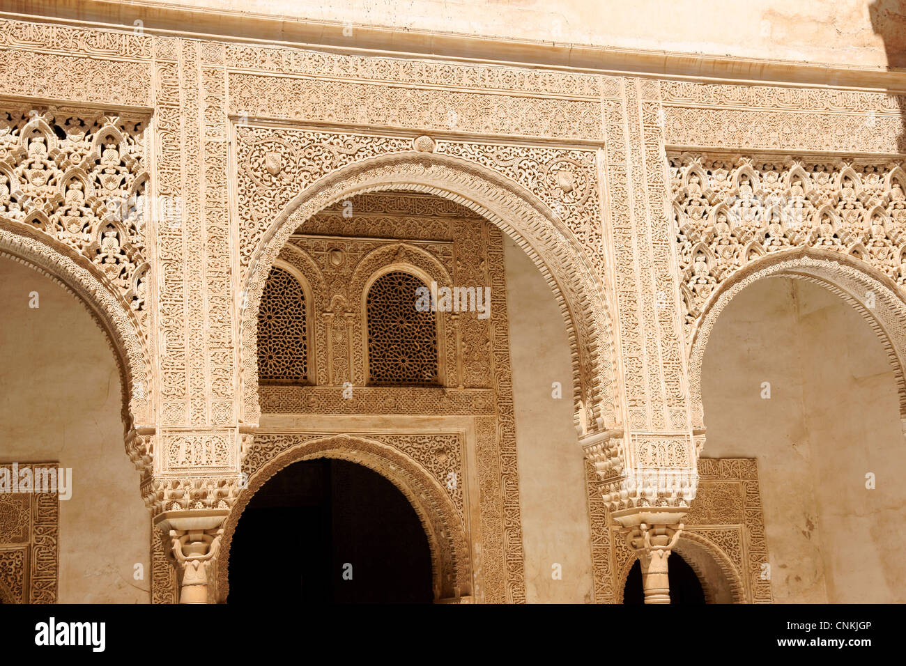 Détail de l'arabe au Palais Nasrides sculptures dans l'Alhambra de Grenade en Andalousie, Espagne Banque D'Images