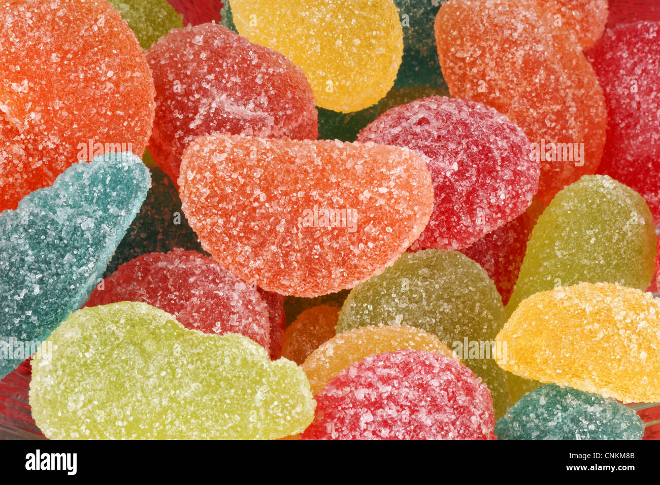 Assortiment de pâtes de fruits aromatisées en forme et contexte Banque D'Images