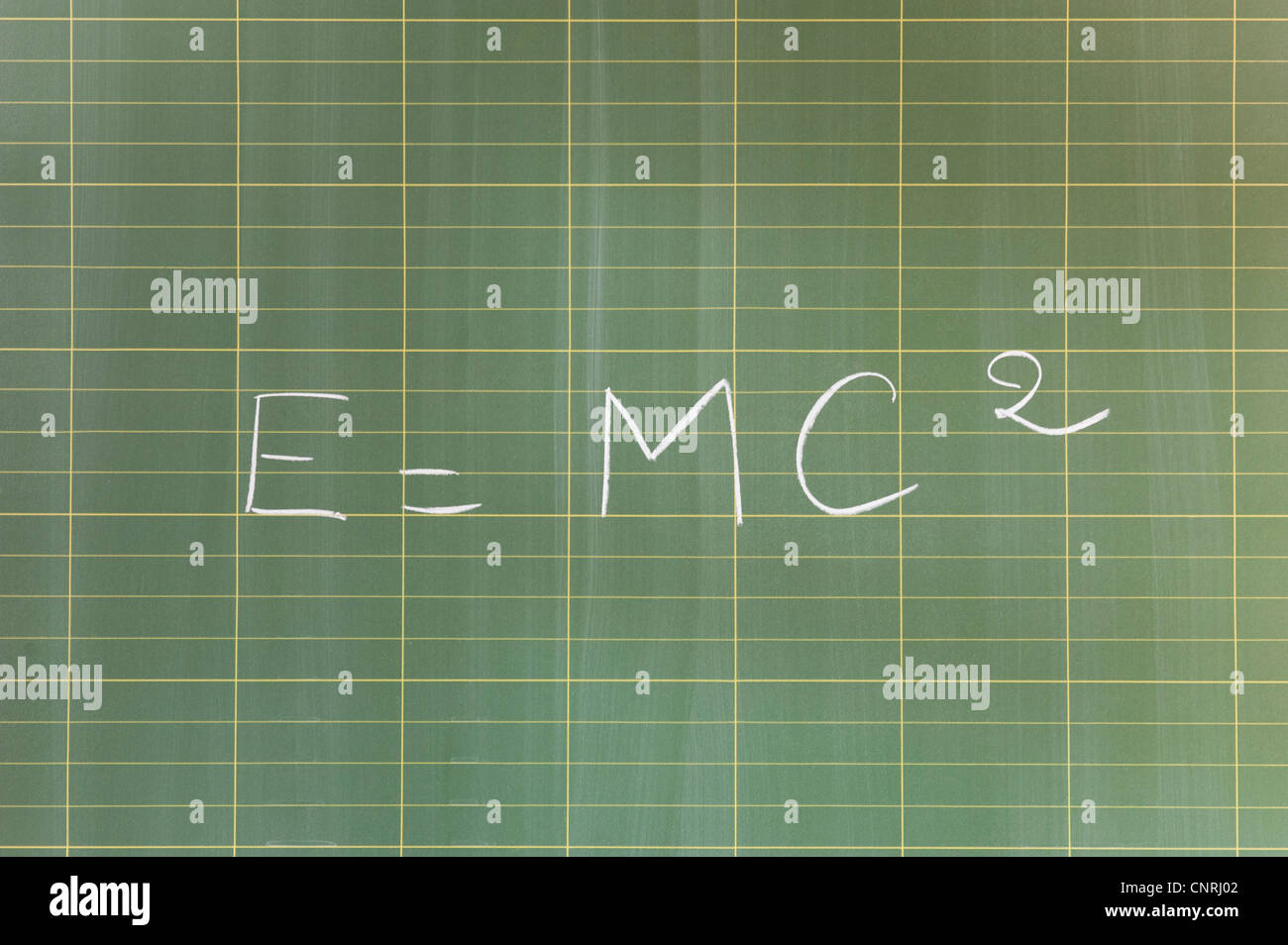 ╨formule d'équivalence masse énergie (E  = mc2) written on blackboard Banque D'Images