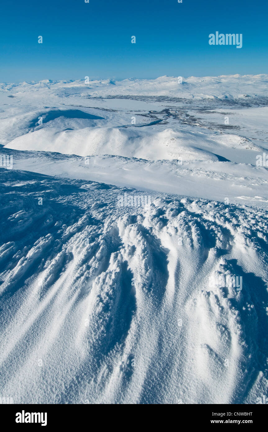 Vue depuis le parc national de Sarek au lac Kutjaure congelés jusqu', et tops mounatin Parc National de Padjelanta, Suède, Laponie, Norrbotten, Sarek National Park Banque D'Images