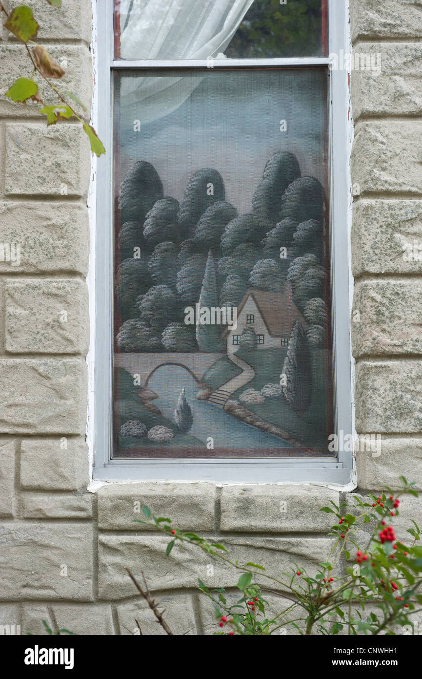 L'art populaire traditionnel, peint dans l'écran fenêtre maison en rangée de Baltimore Banque D'Images