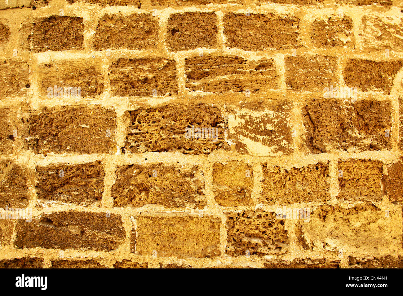 Mur en briques de grès, peut être utilisé comme arrière-plan Banque D'Images