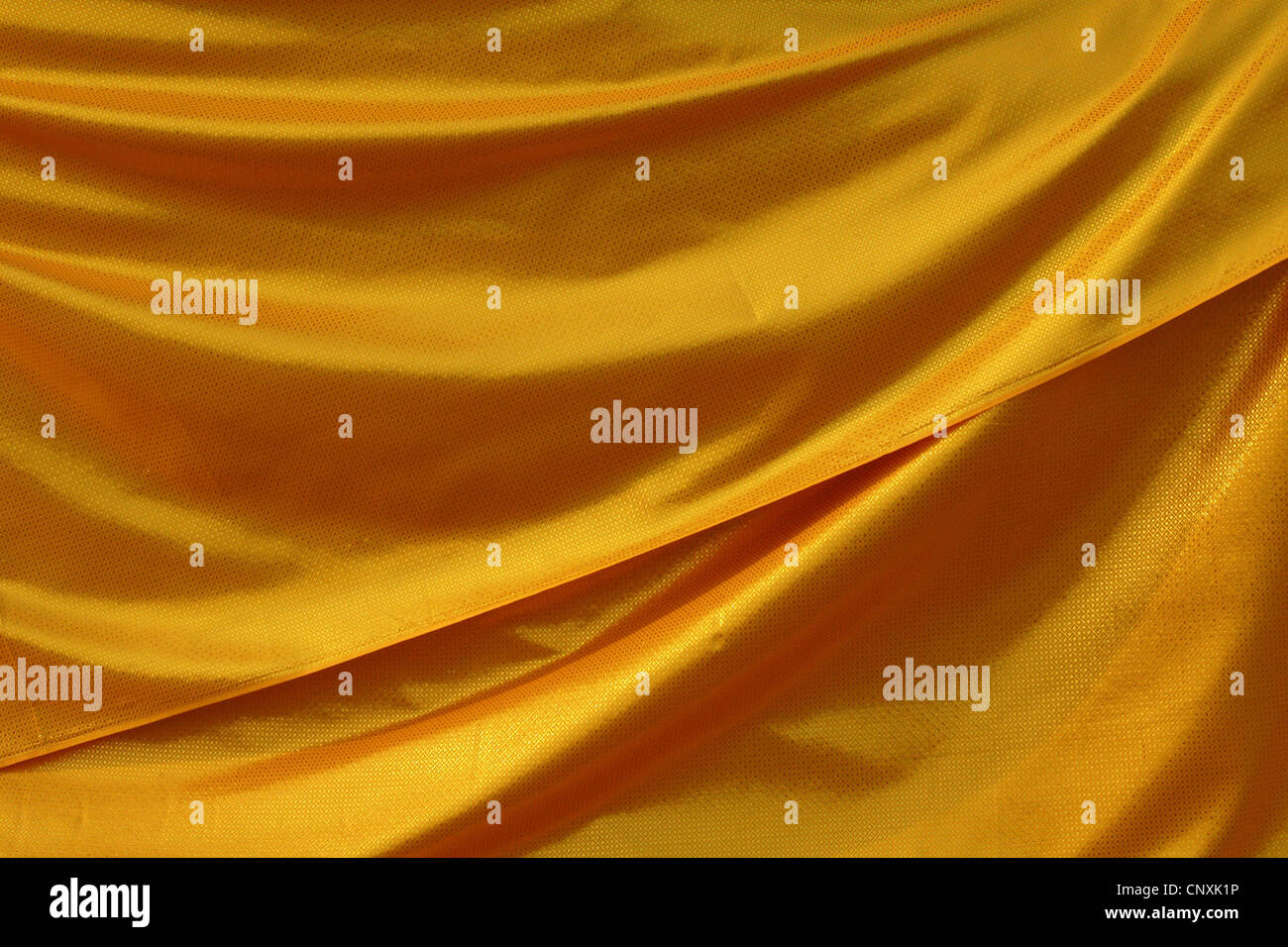 Tissu orange bouddhiste à Phra Pathom Chedi à Nakhon Pathom, Thaïlande. Banque D'Images