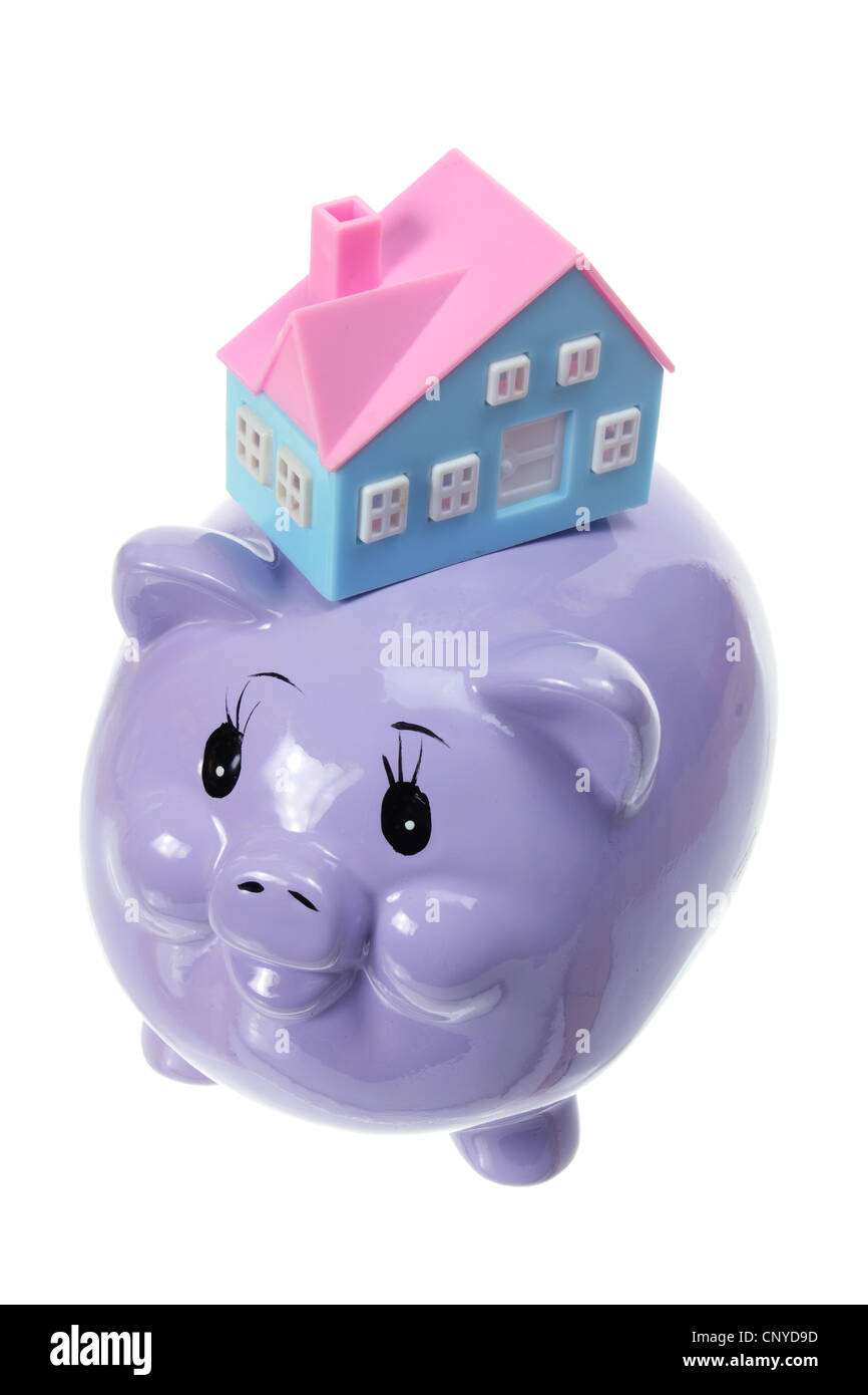 Piggy Bank with Miniature House Banque D'Images