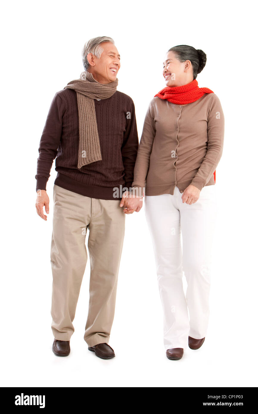 Affectueux Senior couple holding hands Banque D'Images