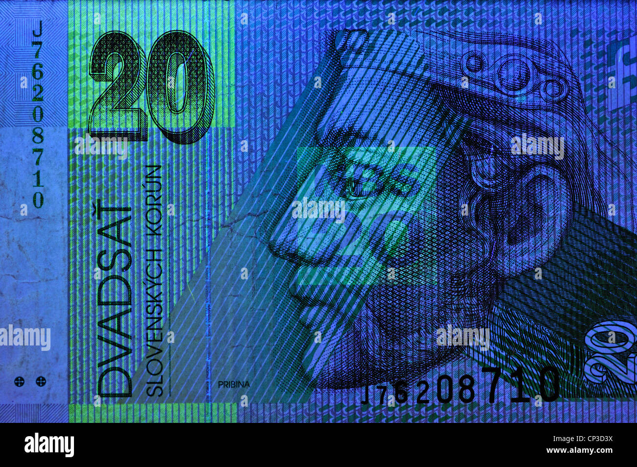 Billet de banque sous la lumière ultraviolette montrant les éléments de sécurité invisibles dans la lumière normale. 20 Crown / Korun remarque ; Slovaquie Banque D'Images