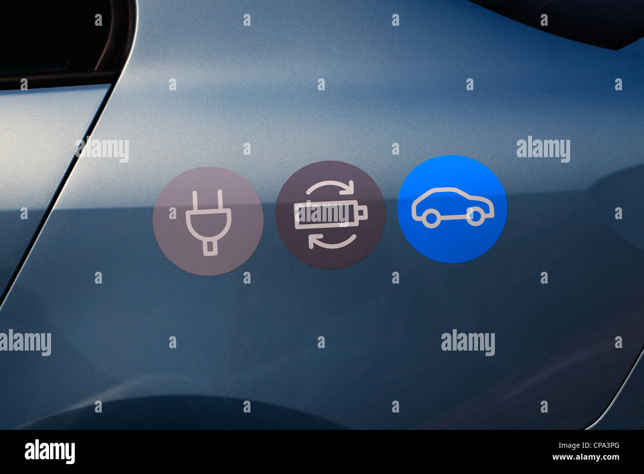 Symboles sur une voiture électrique Banque D'Images