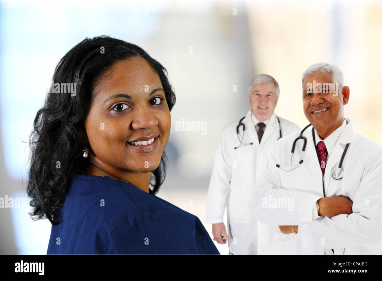 Groupe de médecins et infirmier sur fond blanc Banque D'Images