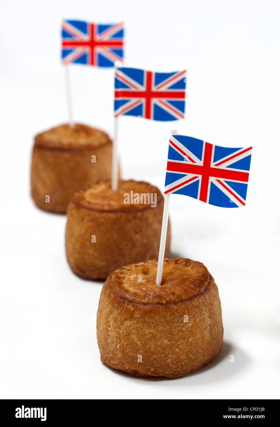 Porc britannique tartes avec union jack flag sur fond blanc Banque D'Images