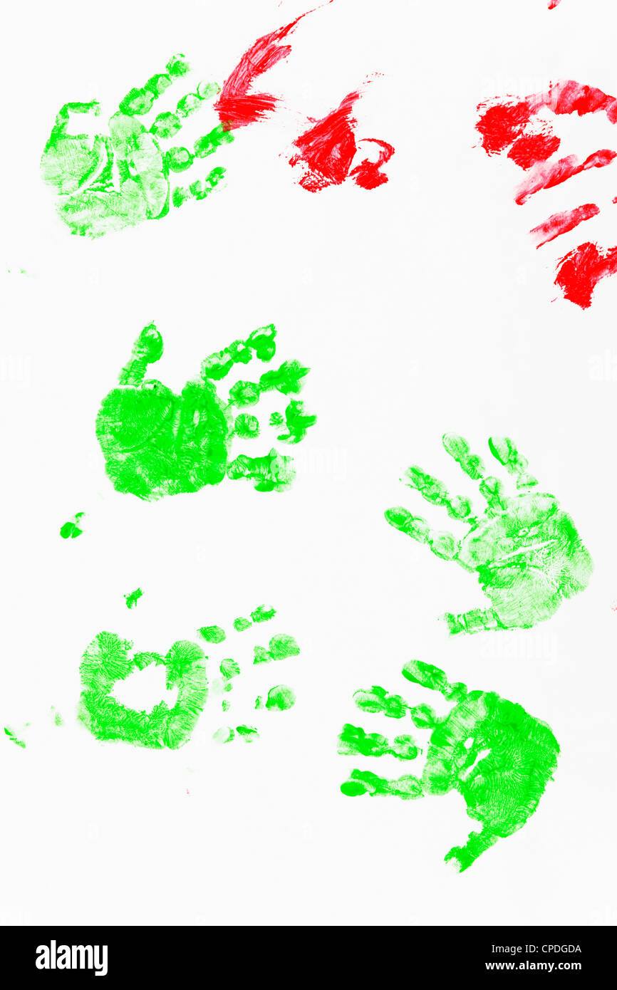 Les mains des enfants imprime en rouge et vert aquarelles Banque D'Images