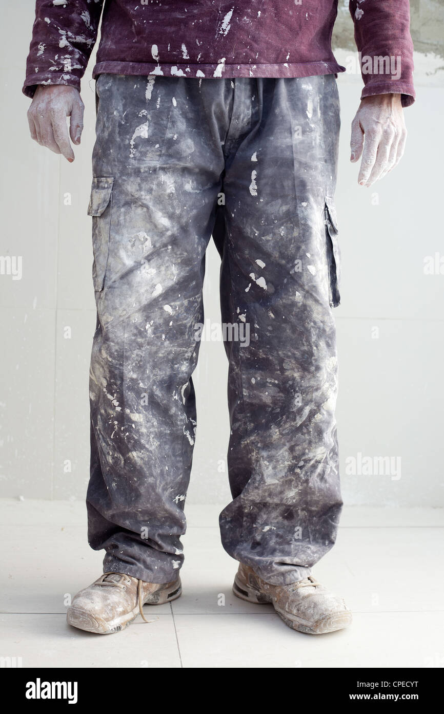 Mains et blanc pantalon sale de détail homme Peintre Plâtrier Photo Stock -  Alamy