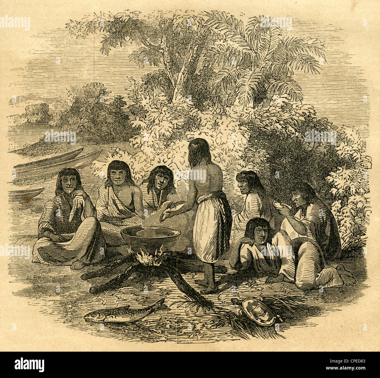 Coribos 1854 gravure, indiens, réunis autour d'un feu, sur laquelle est disposée une sorte de chaudrée pour leur repas. Banque D'Images Coribos 1854 gravure, indiens, réunis autour d'un feu, sur laquelle est disposée une sorte de chaudrée pour leur repas. Banque D'Images