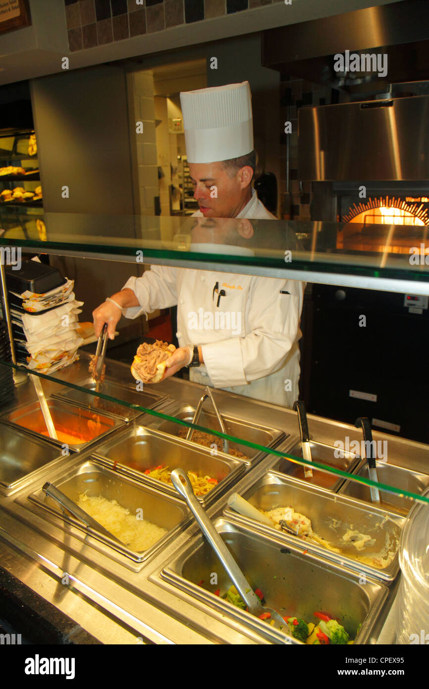 Orlando Florida, Rosen Shingle Creek Water, hôtel hôtels hôtels hôtels hôtels motels, Resort, 18 Monroe Street Market, traiteur 24 heures, cuisinier, faire des sandwichs, buffle Banque D'Images