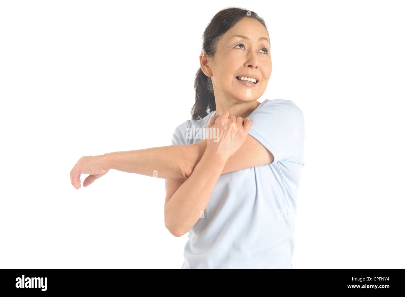 Bras supérieur Senior woman stretching Banque D'Images